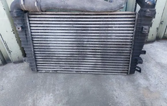 Opel Zafira B Intercooler radiator 13223395 0386A