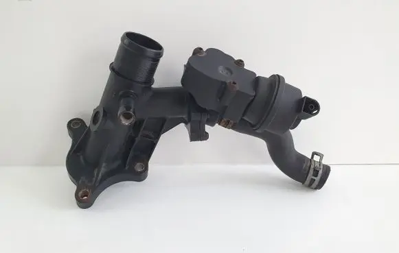 Thermostat/thermostat housing