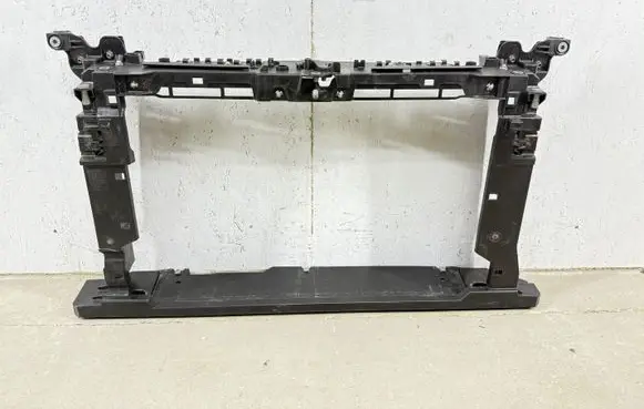 Radiator support slam panel
