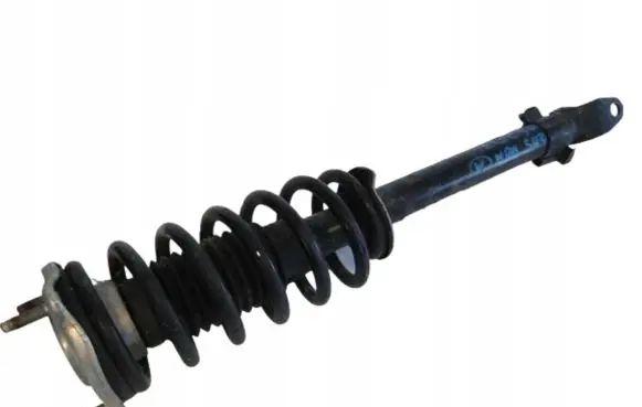 Front shock absorber with coil spring