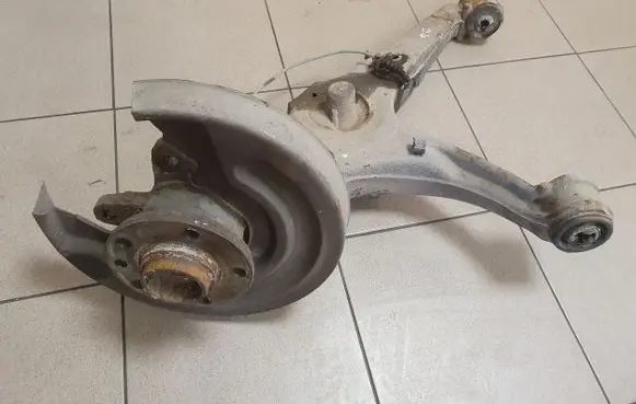 Rear wheel hub spindle/knuckle