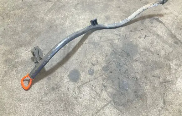 Oil level dip stick
