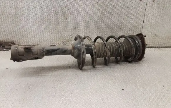 Toyota Yaris Front shock absorber with coil spring