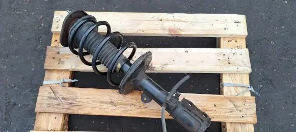 Toyota Corolla E120 E130 Front shock absorber with coil spring
