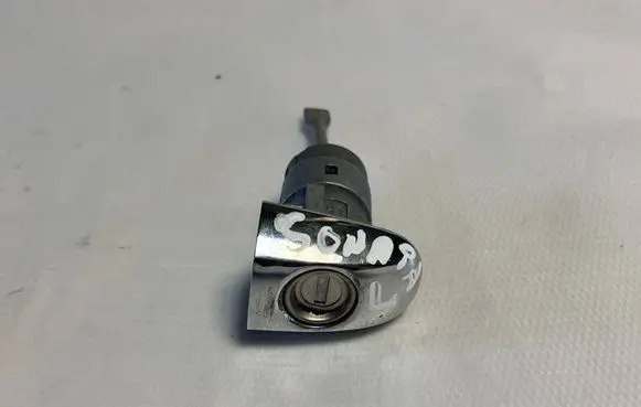 Hyundai Sonata Front door lock (next to the handle) 