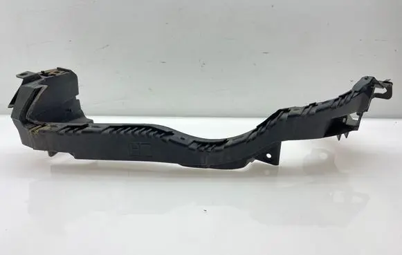 Subaru Legacy Headlight/headlamp mounting bracket 