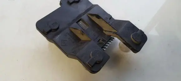 Tail light bulb cover holder