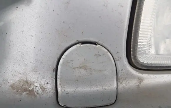 Nissan Almera N16 Front tow hook cap/cover