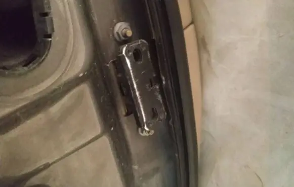 Nissan Note (E11) Rear door check strap stopper