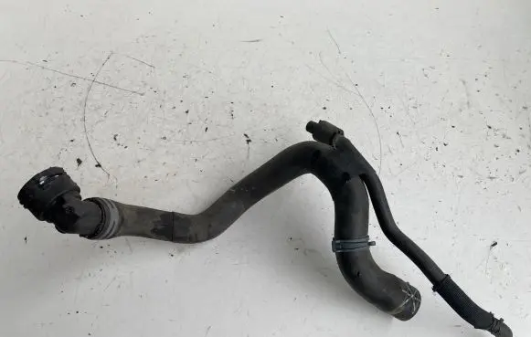 Volkswagen Golf VII Engine coolant pipe/hose 5Q0122101EH
