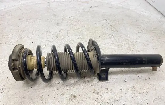 Volkswagen Touran I Front shock absorber with coil spring 335808