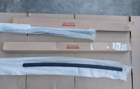 Toyota Corolla E210 E21 Rear bumper trim bar molding PW17802010