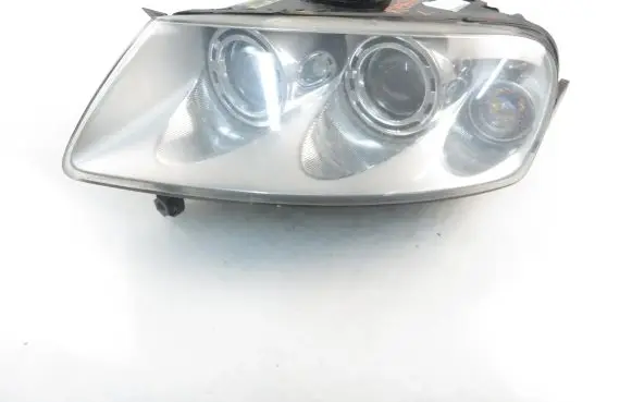 Volkswagen Touareg I Headlight/headlamp 7L6941015BK
