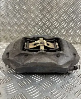 Volkswagen Touareg II Front brake caliper 7P6615105AE
