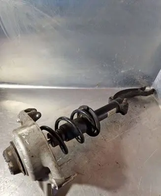 Front shock absorber with coil spring