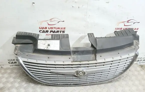 Chrysler Grand Voyager IV Front bumper upper radiator grill 4857522AA 04857410AB