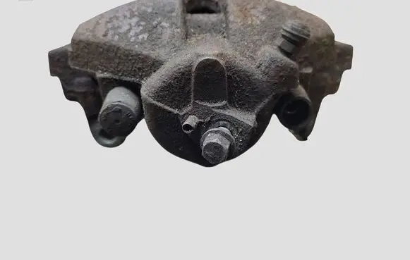 Volkswagen Touran I Front brake caliper