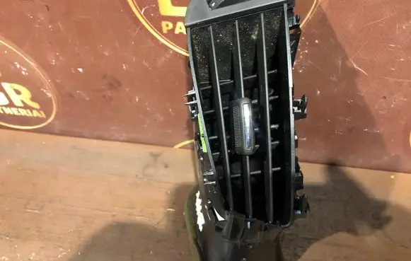 Dash center air vent grill