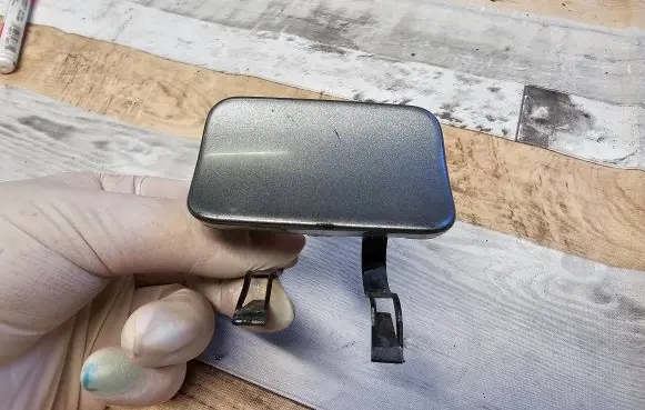 Rear bumper row hook cap/cover