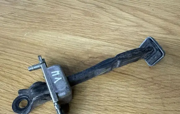 Subaru Forester SH Front door check strap stopper 