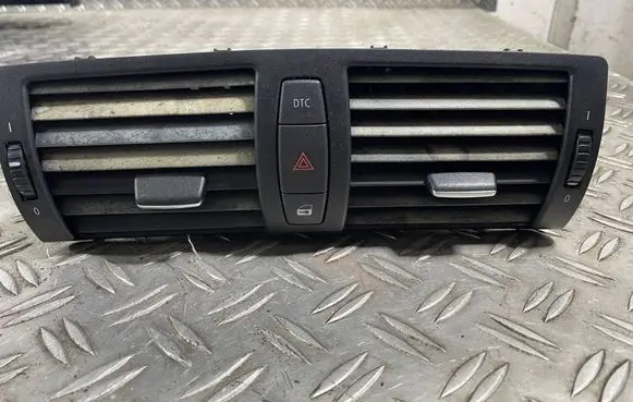 Dash center air vent grill