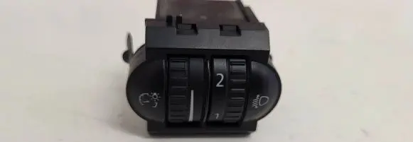 Headlight level height control switch
