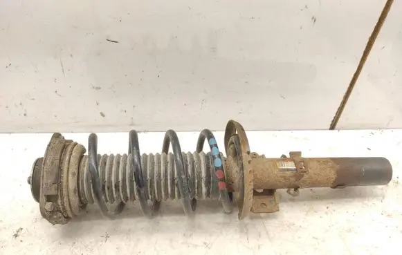 Audi A2 Front shock absorber with coil spring