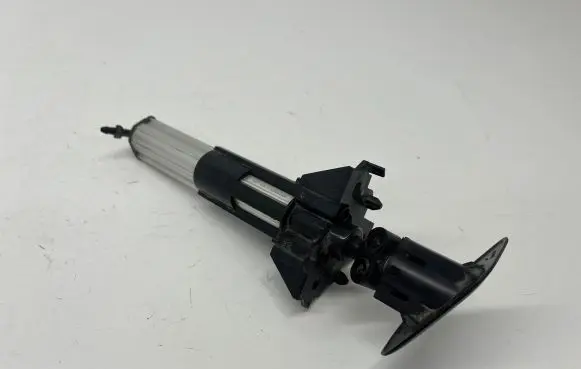 Peugeot Partner Headlight washer spray nozzle 1306179 085130501