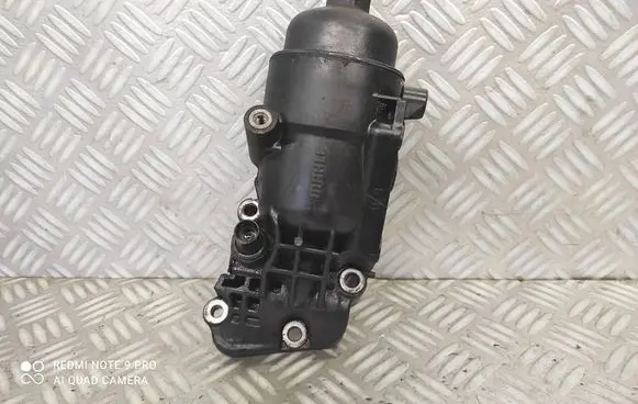 KIA Rio Oil filter mounting bracket 264002A021