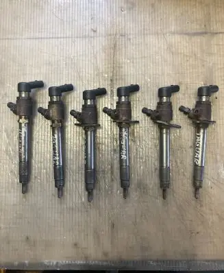 Jaguar XF Fuel injectors set 4S7Q9K546AF G1UHF DG15