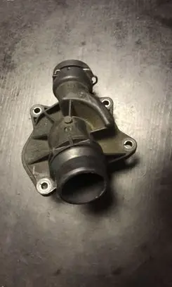 Thermostat/thermostat housing