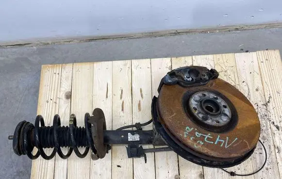 Front shock absorber with coil spring