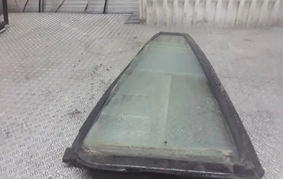 Mazda Demio Rear vent window glass 