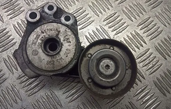 Volkswagen Touran I Alternator belt tensioner pulley 03C145299J