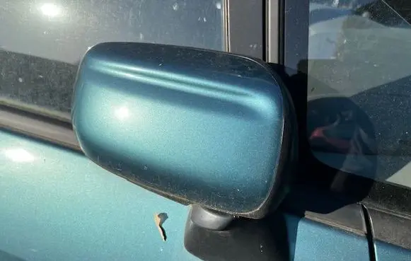 Manual wing mirror