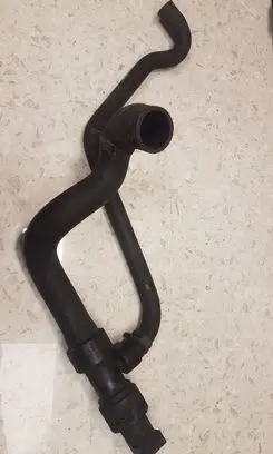 Volkswagen PASSAT B5 Engine coolant pipe/hose 8D0121055F