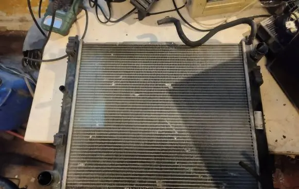 Nissan Juke I F15 Coolant radiator 21410BA62A H0N130VW