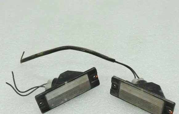 Mitsubishi Pajero Number plate light MB859364 MR441889