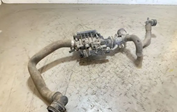 Thermostat/thermostat housing
