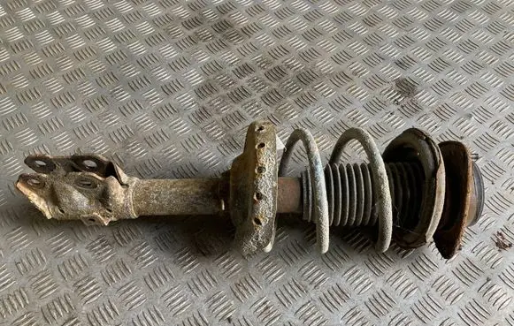 Front shock absorber with coil spring