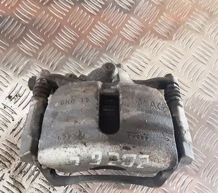 Volkswagen Golf VII Front brake caliper