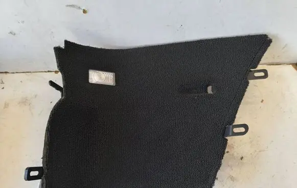 Trunk/boot lower side trim panel