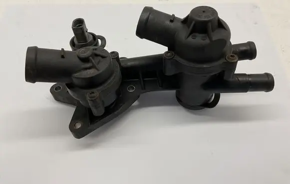 Thermostat/thermostat housing