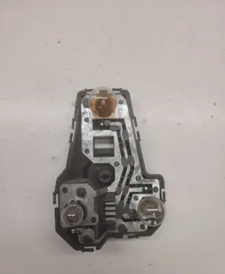 Tail light bulb cover holder