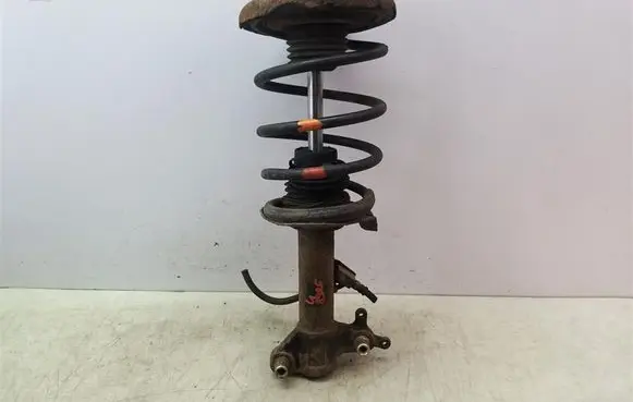 Nissan Primera Front shock absorber with coil spring
