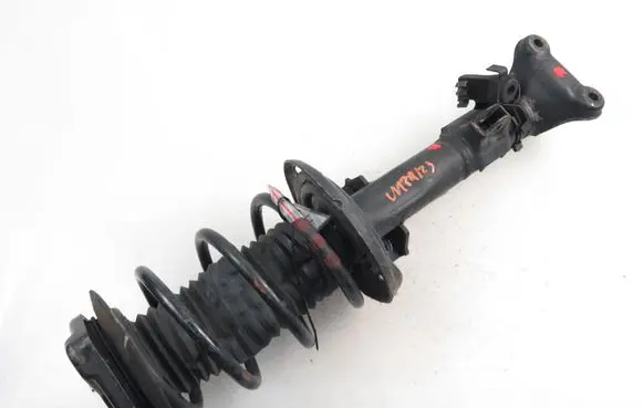 Mercedes-Benz E C207 W207 Front shock absorber with coil spring 2073207138