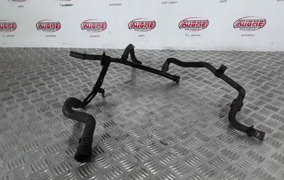 Volkswagen Golf V Engine coolant pipe/hose 038121065