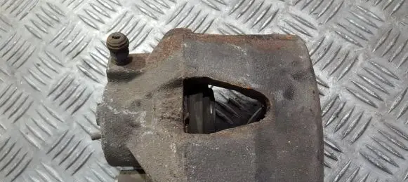 Volkswagen Golf V Front brake caliper