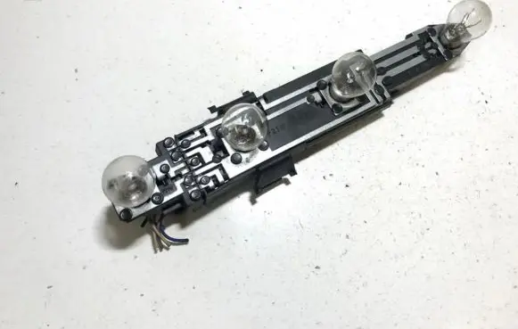 Renault Laguna I Tail light bulb cover holder