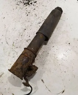 Suzuki Grand Vitara I Front shock absorber/damper